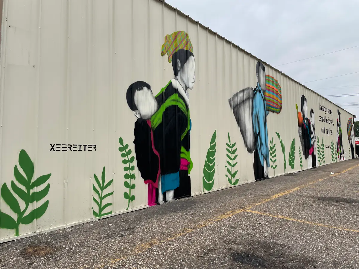 HOME mural painted on The Point Vietnamese Market & Restaurant in Stevens Point, Wisconsin.