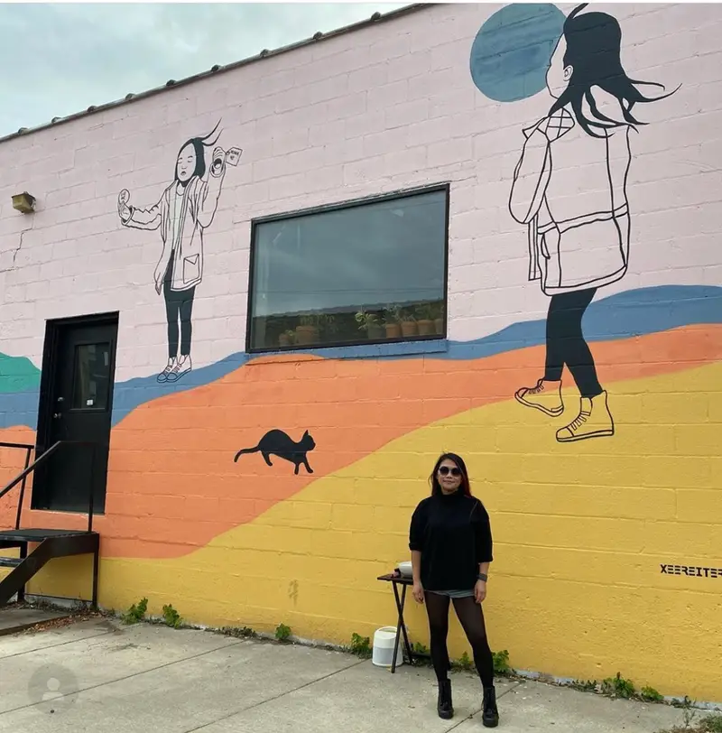 Wonderland mural at 809 Carleton Street in the Saint Anthony neighborhood of Saint Paul.